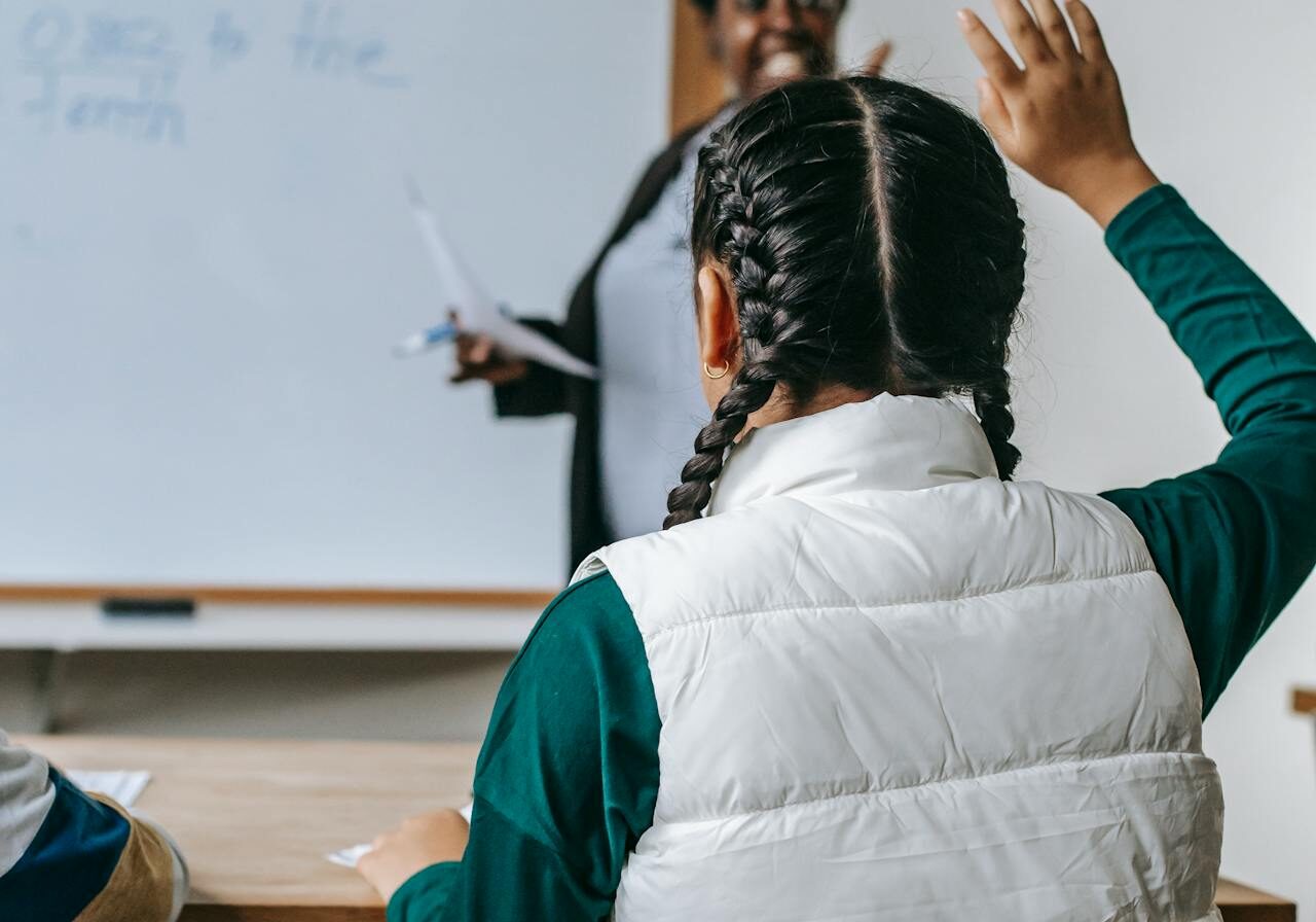 Student raising hand